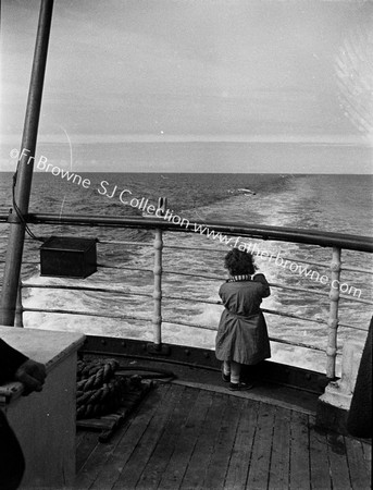 LITTLE GIRL LOOKS BACK AT WALES FROM STERN OF SS SCOTIA